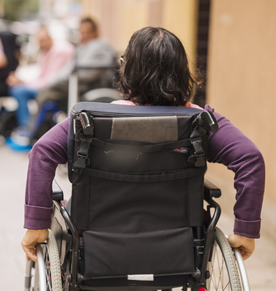 Support worker helping with high intensity daily living activities